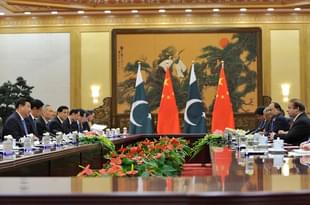 Chinese President Xi Jinping speaks with Pakistan’s Prime Minister Nawaz Sharif  at the Great Hall of the People in Beijing, China. (Parker Song-Pool/Getty Images)